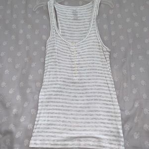 A white and grey tank top